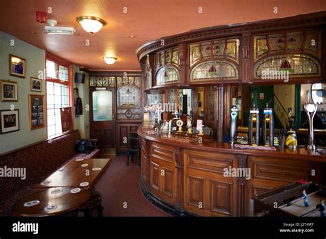 Landmark Manchester green tiled clad Victorian pub Peveril of the Peak interior Stock Photo - Alamy