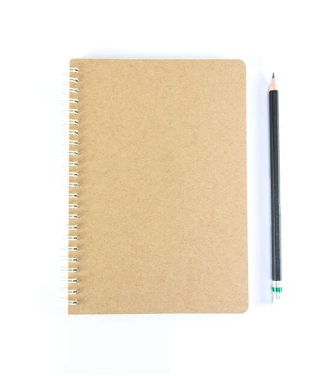 Premium Photo Directly Above Shot Of Book And Pencil Over White
