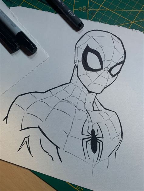 A Drawing Of A Spider Man On Paper