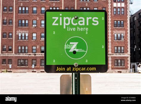 Zipcar Rideshare Sign Buy A Parking Lot Stock Photo Alamy