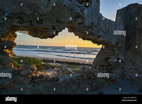 Hole In A Wall On Beach Stock Photo Alamy