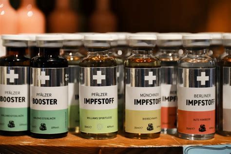 Collection Of German Liqueur Bottles In Museum · Free Stock Photo