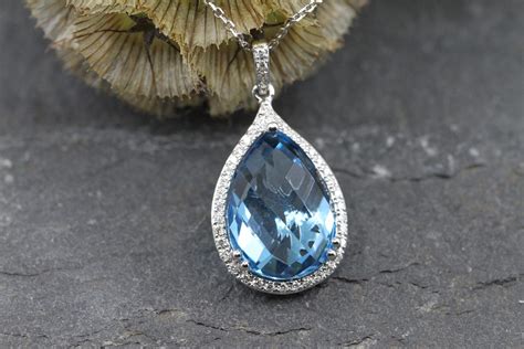 Pear Shaped Blue Topaz & Diamond Pendant. | Dent Jewellers