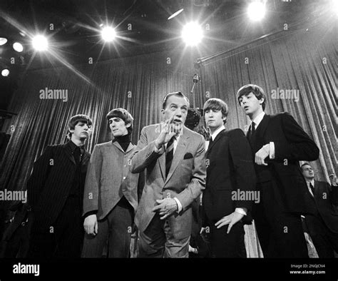 Ed Sullivan Center Stands With The Beatles During A Rehearsal For The