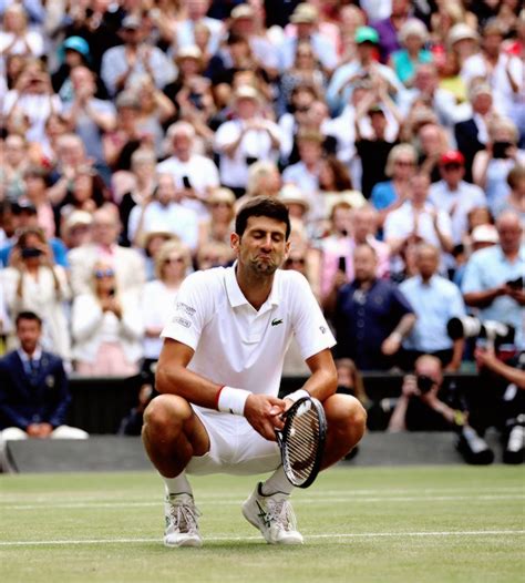 Oliviergiroudd Novak Djokovic Eats The Wimbledon Grass After