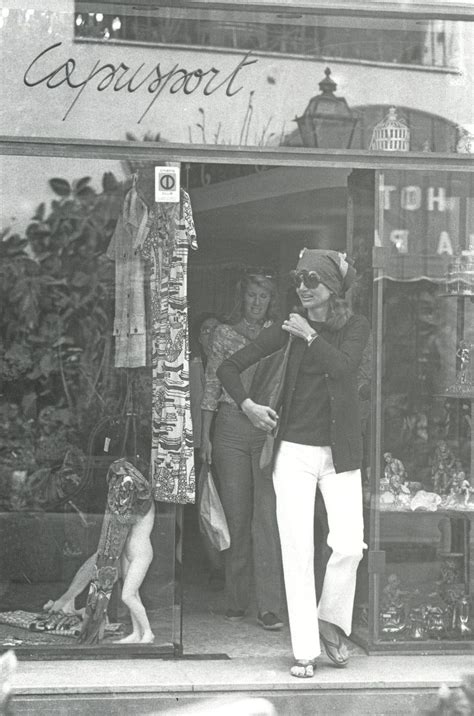 Jackie Kennedy Onassis Timeless Style White Pants Scarf Simple Sweater And The Omnipresent