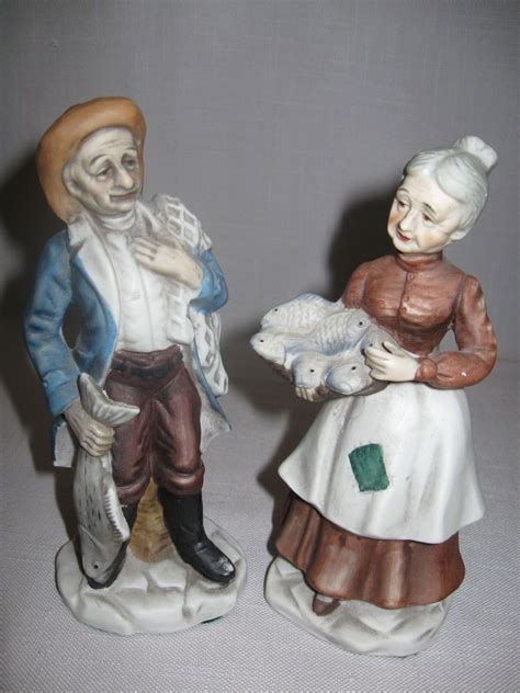 Bisque Porcelain Figurine Statue Man Holding Fish And Woman With A Fish