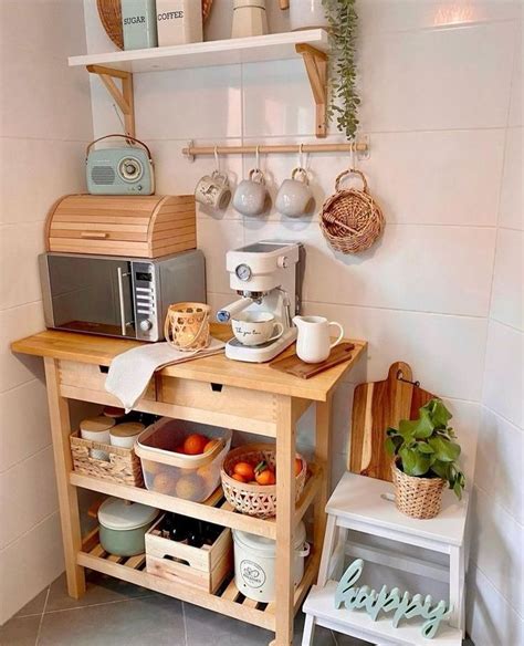 A Kitchen Area With Coffee Maker Microwave And Other Items