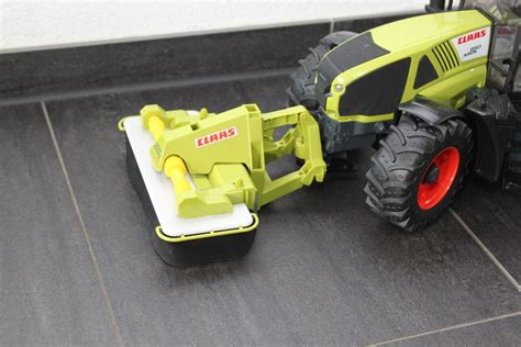 Traktor BRUDER CLAAS mit Ballenpresse und Frontmäher Kaufen auf Ricardo