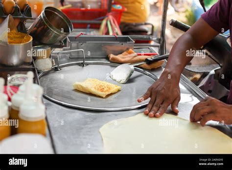 Cooking Traditional Thai Fried Banana Pancakes Roti Closeup Asian Street Food Preparation In