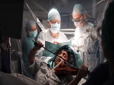 Woman plays violin while undergoing tumor removing surgery