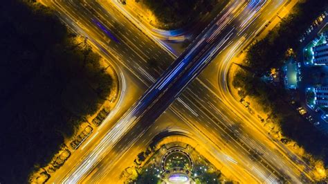 Premium Photo | Overpass tollway and road interchange at night