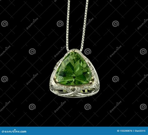 White Gold Necklace With Peridot And Diamonds On Black Stock Photo