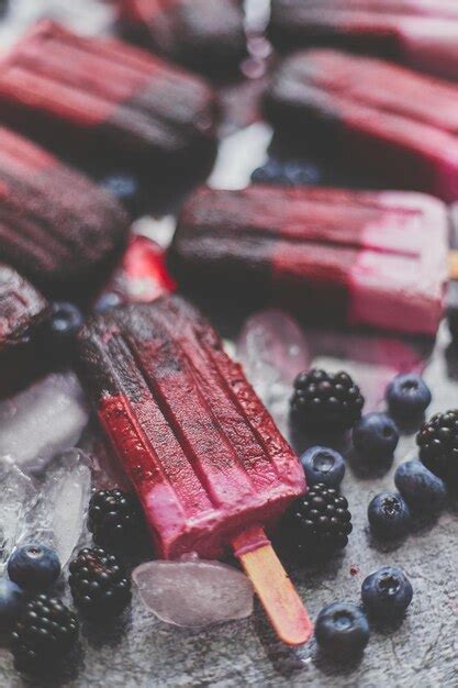 Premium Photo Homemade Blackberry And Cream Icecreams Or Popsicles