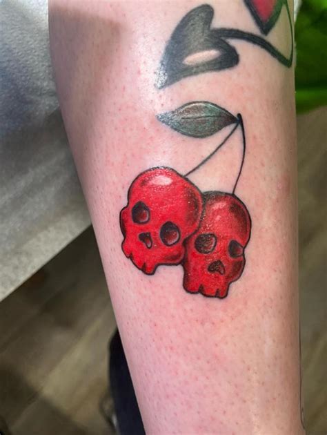 Cherry Skulls By Sketchy Shay Tattoonow