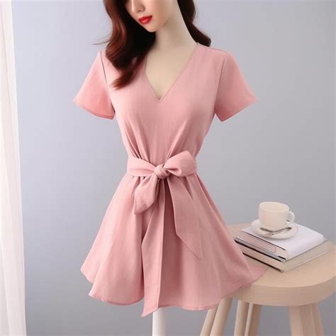 Premium Ai Image A Mannequin Wearing A Pink Dress With A Bow On It