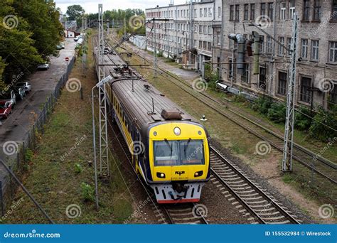 Shot of a Yellow Train on a Rail Editorial Stock Image - Image of road ...