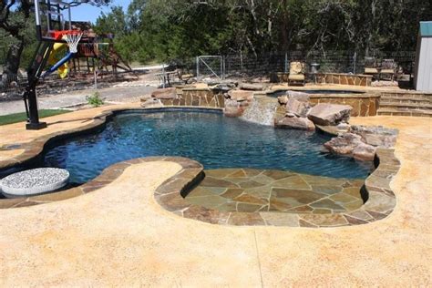 Beautiful Freeform Pool Spa With A Pool Bar Rustic Pool Austin