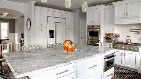 Super White Quartzite Countertops In An Elegant Kitchen