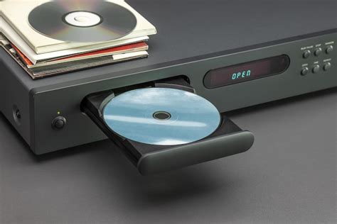 Premium Photo Cd Player With Open Tray Close Up Disc Envelopes On The