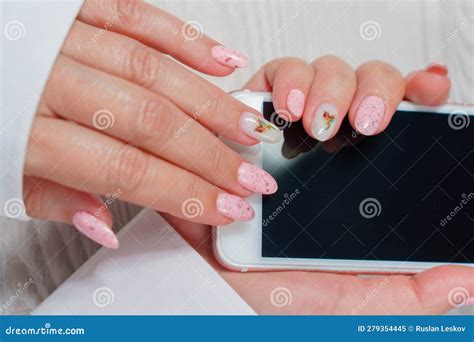 Women S Manicure In Pink Close Up A Woman S Hand With A Beautiful