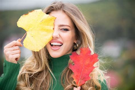 Autumn Woman With Fall Yellow Maple Leaf Outdoor Portrait Beautiful