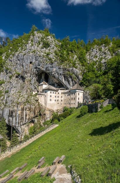 Premium Photo Predjama Castle Built Into A Cave In Slovenia