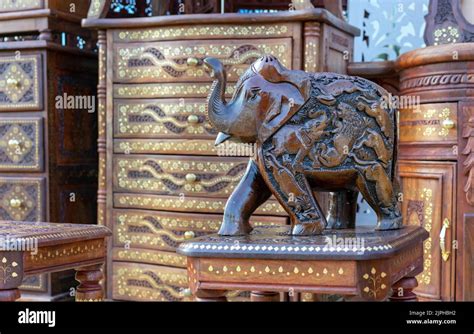 Wooden Figurine Of An Indian Elephant With A National Ornament