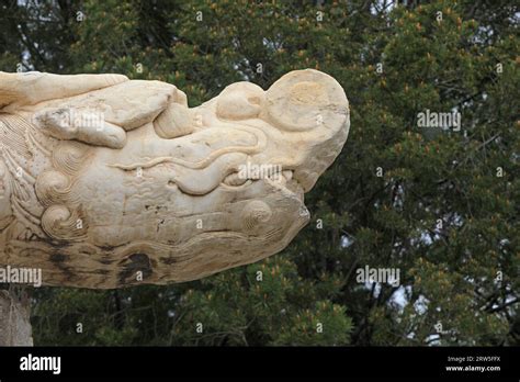 The dragon head sculpture is in a temple, Beijing Stock Photo - Alamy