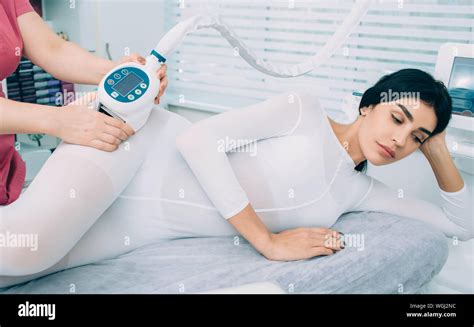 Woman Getting Anti Cellulite Massage With Special Beauty Equipment