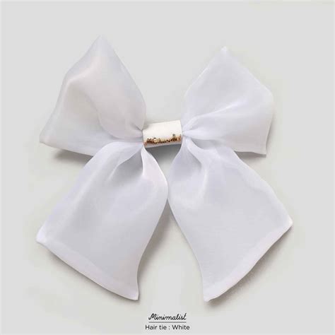 Oversized hair tie's bow in white. - Minimalist