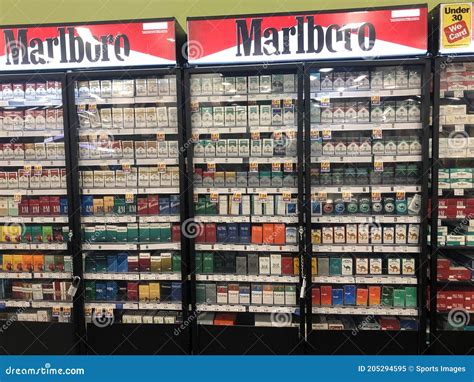 Cigarettes In A Display Case In A Supermarket Editorial Image Image