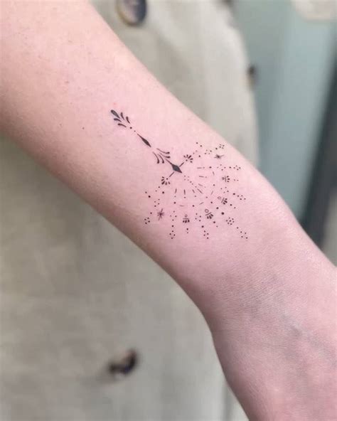 Ornamental Design Tattooed On The Wrist Fine Line