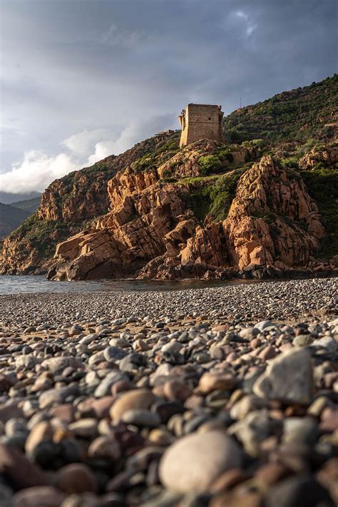 Pebbles Rocks Sea Coast Building Nature HD Phone Wallpaper Peakpx