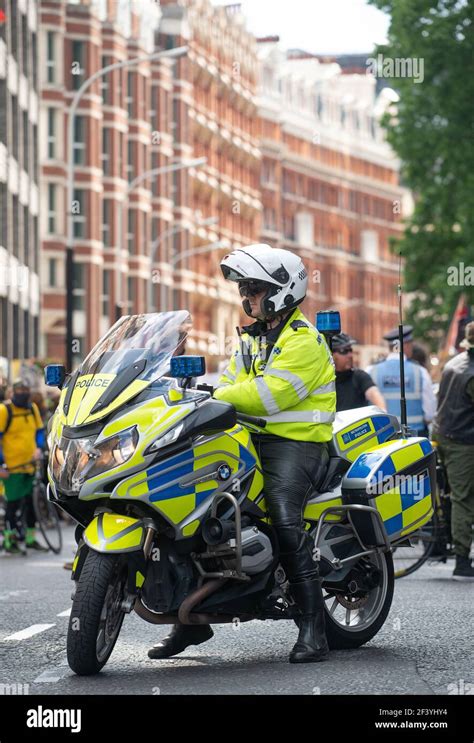 Metropolitan Police Motorcycle Officer Monitoring Demonstration