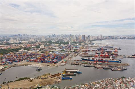 Trading Port in Manila. Cargo Cranes and Containers in the Port Stock ...