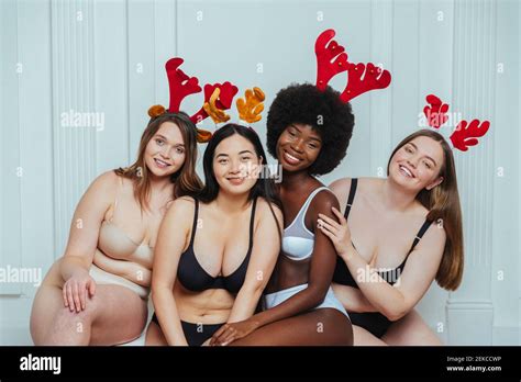 Smiling Multi Ethnic Group Of Model Friends In Lingerie Wearing