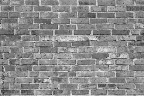 Seamless brick wall texture for mapping a material in a 3D game or render. Grayscale version ...