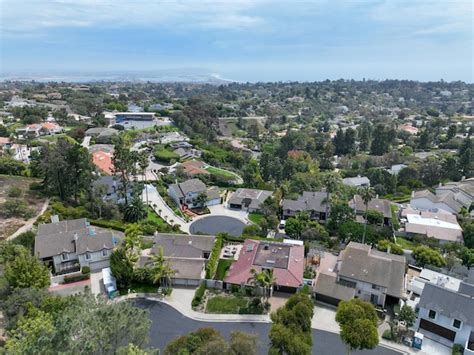 Premium Photo A View Of A Neighborhood With A Few Houses And A Fire