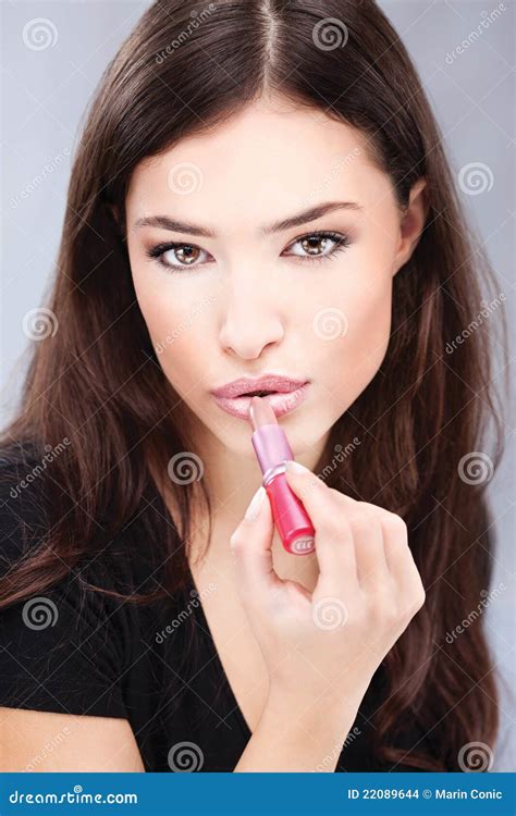 Woman Putting Lipstick On Her Lips Stock Photo Image Of Lips Youth