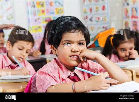 Indian School Kids Students Book Studying Education In Classroom Stock