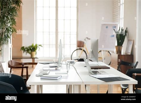 Empty Office Space For Small Team Working Together Stock Photo Alamy