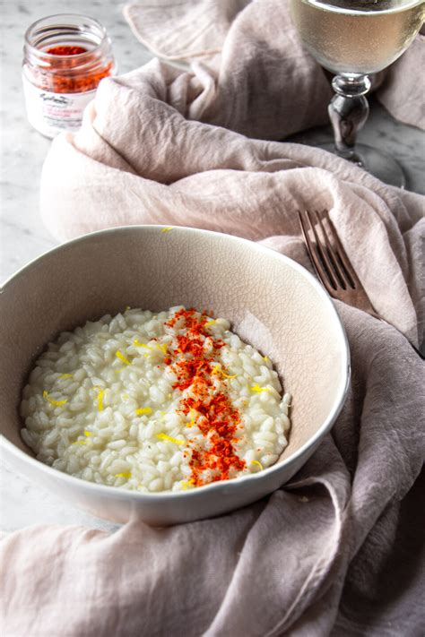 Risotto Al Limone Con Polvere Di Teste Di Gamberi Rossi Peperoni E Patate