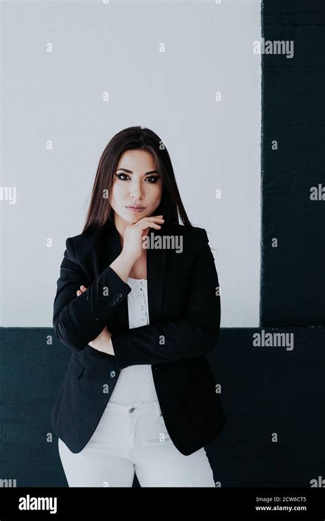 Beautiful Brunette Woman In Business Suit In Office Business Portrait Stock Photo Alamy