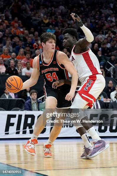 Zach Martini Of The Princeton Tigers Drives To The Basket Against