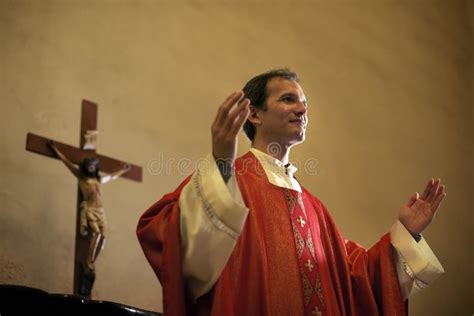 Catholic Priest On Altar Praying During Mass Stock Images Image 31123734