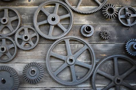 Wooden Wall With Gears Or Cogwheel Stock Photo Image Of Lawn Garden