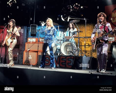 The Sweet Uk Group In 1973 With Brian Connelly In Blue Stock Photo