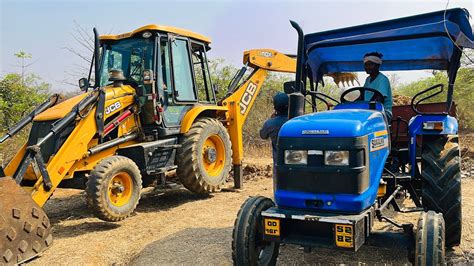 Jcb Dx Backhoe Machine Loading Mud In Tractors For Road Making