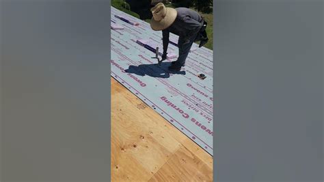 Nailing The Underlayment With A Hammer Magnet Contractor Designandbuild Generalcontractor